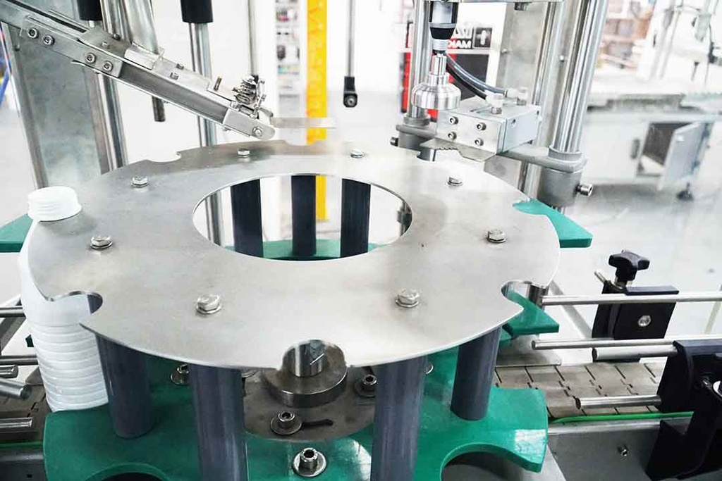 Bottle filling capping machine - jar filling and screwing labeling machine